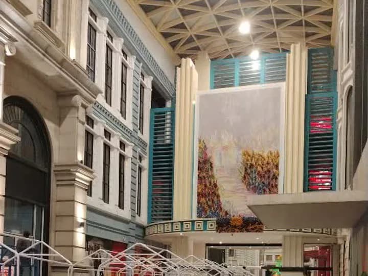 Open-frame display structures being installed in a public interior