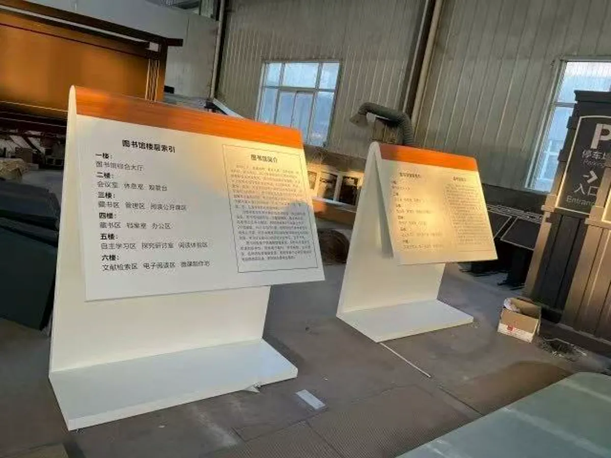 Two freestanding angled information stands completed in the workshop